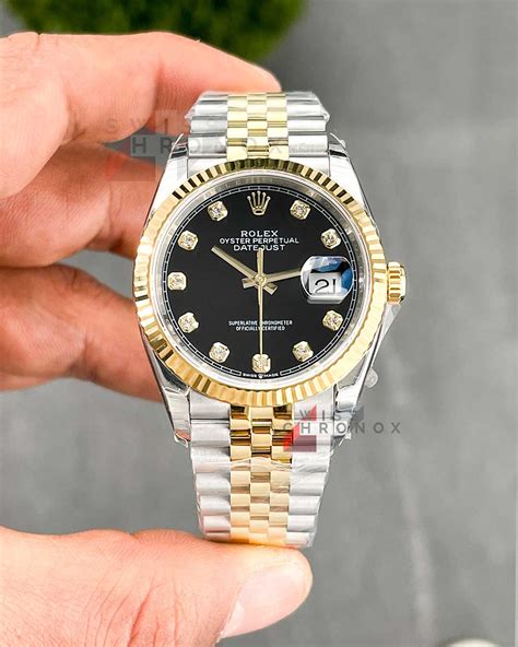 rolex black face with diamonds.